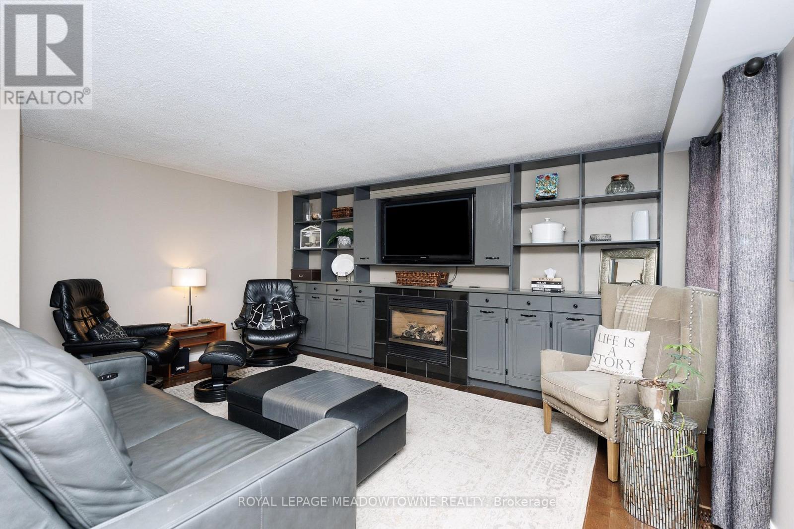 38 Mckillop Court, Brampton, ON - Indoor Photo Showing Living Room With Fireplace