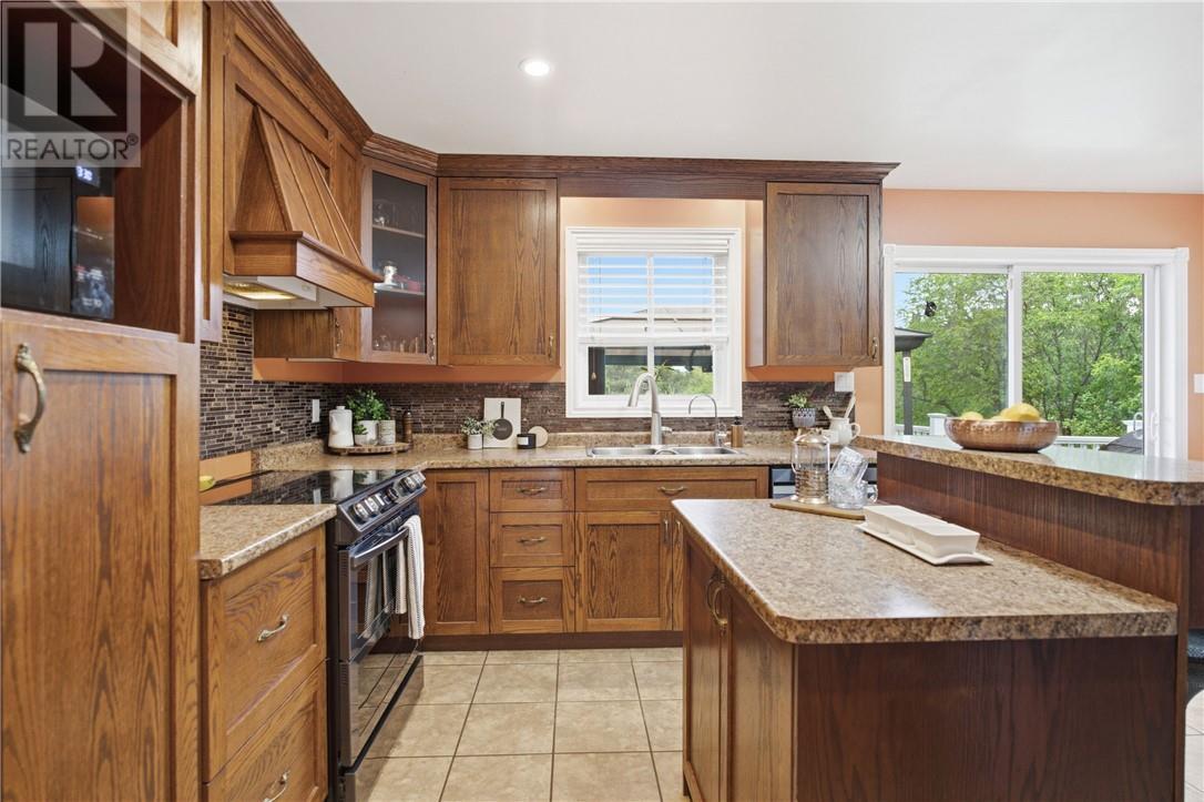 345 Cote Avenue, Hanmer, ON - Indoor Photo Showing Kitchen With Double Sink