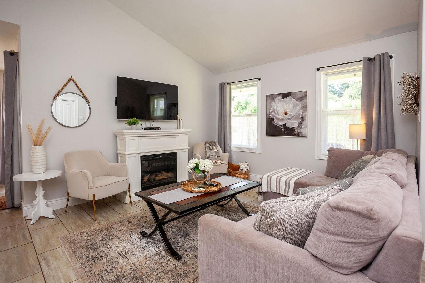 22 170 Schoolhouse Lane, Stanley Bridge, PE - Indoor Photo Showing Living Room With Fireplace