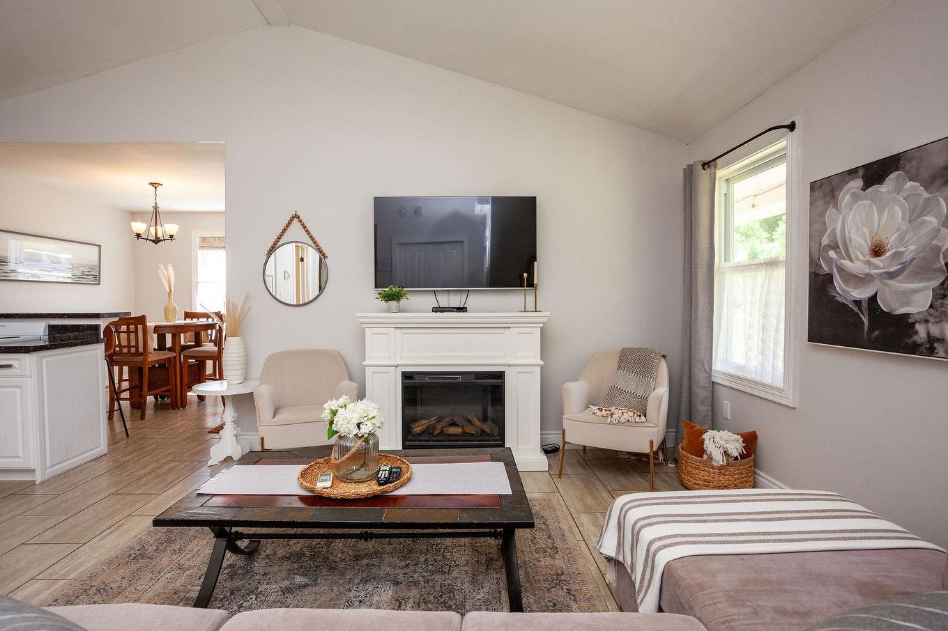 22 170 Schoolhouse Lane, Stanley Bridge, PE - Indoor Photo Showing Living Room With Fireplace