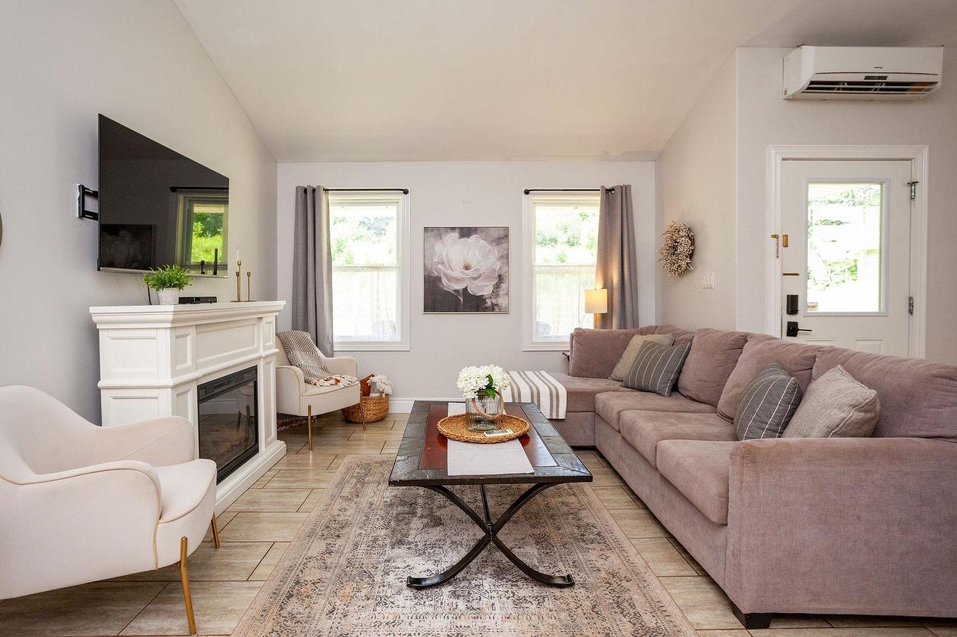22 170 Schoolhouse Lane, Stanley Bridge, PE - Indoor Photo Showing Living Room With Fireplace