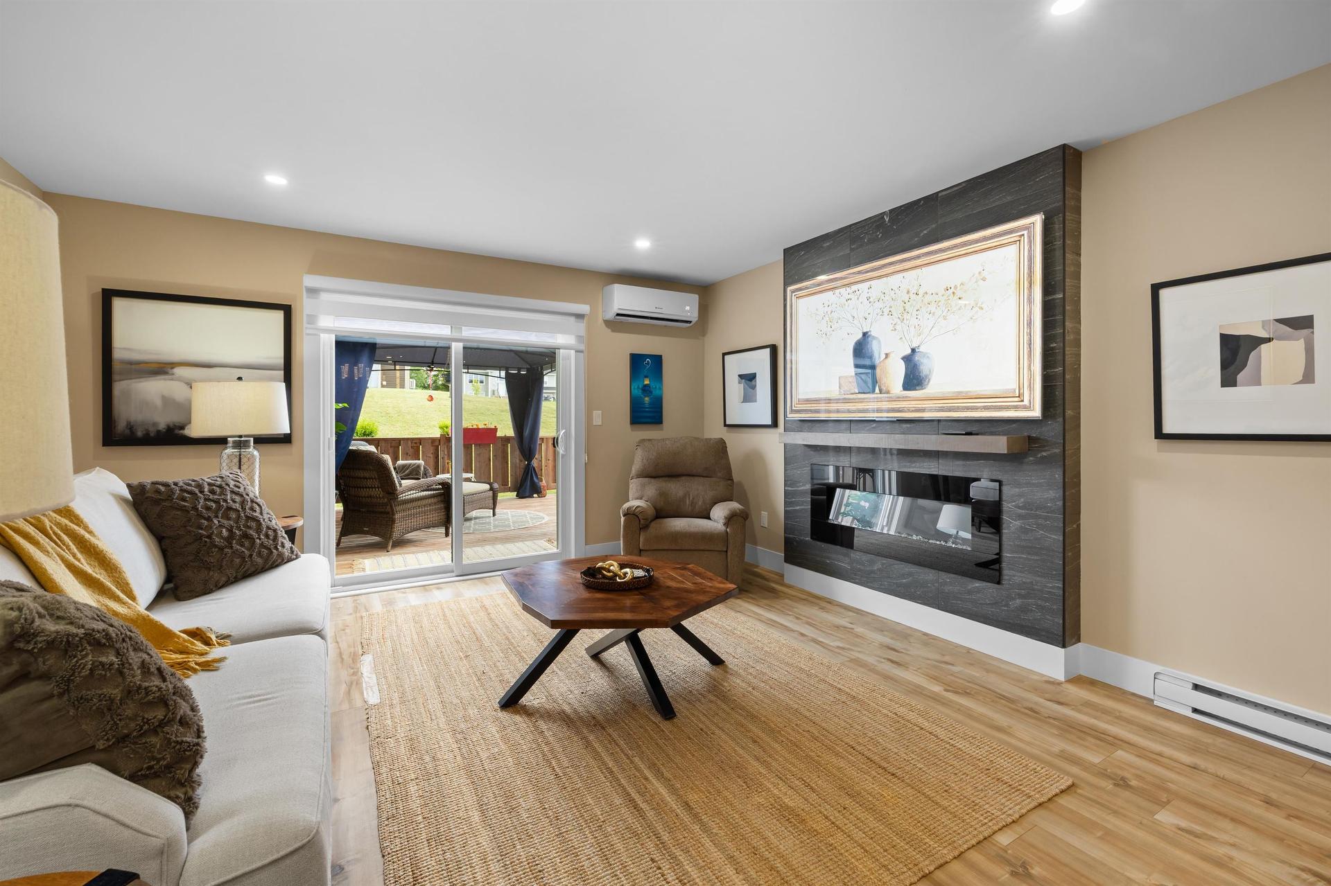 74 Mill Pond Lane, Cornwall, PE - Indoor Photo Showing Living Room With Fireplace