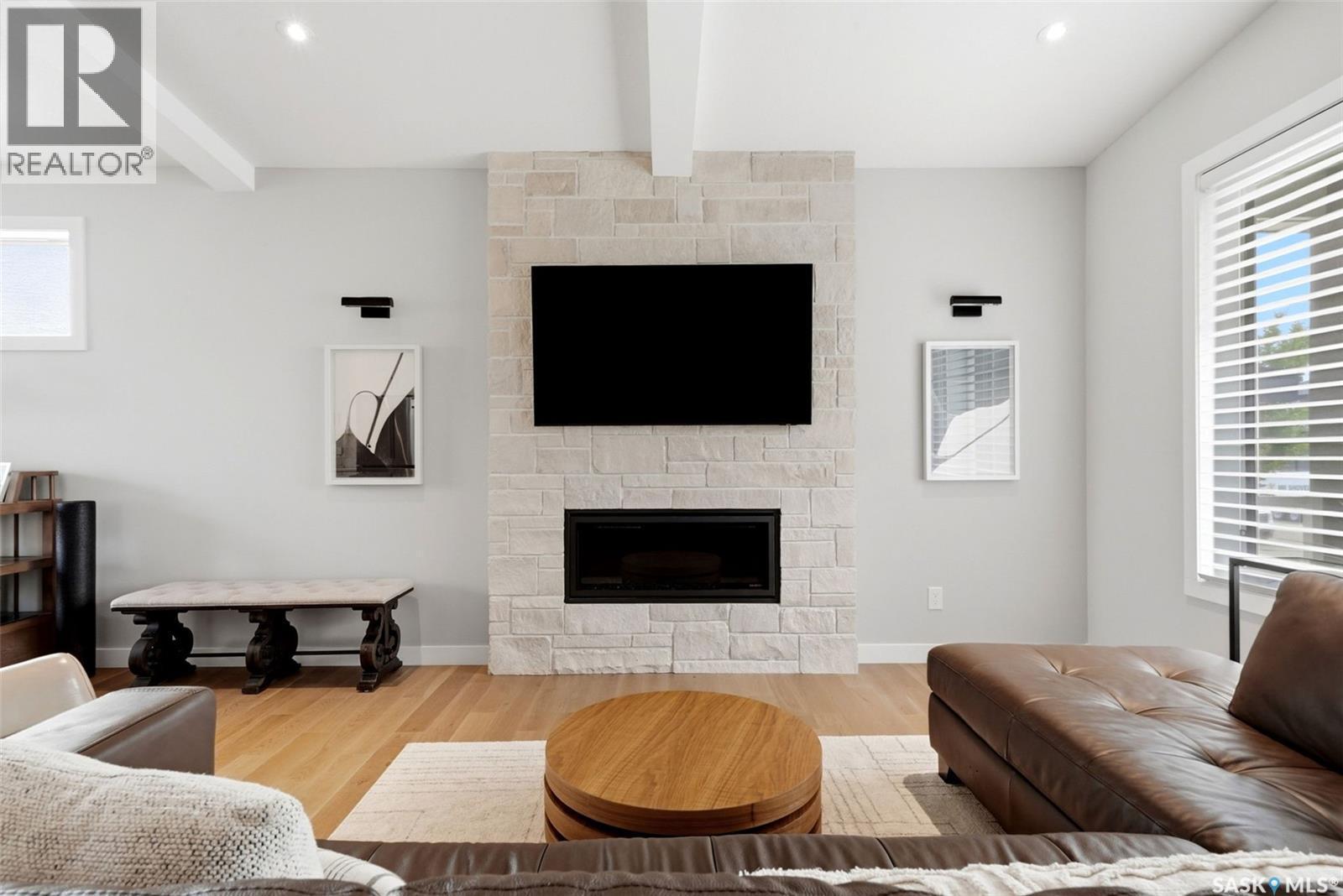 4602 Chuka Drive, Regina, SK - Indoor Photo Showing Living Room With Fireplace