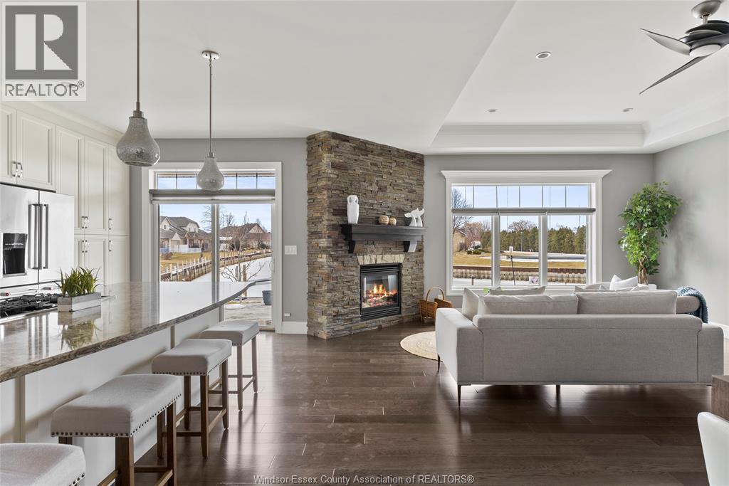 33 Montego Bay Crescent, Kingsville, ON - Indoor Photo Showing Living Room With Fireplace