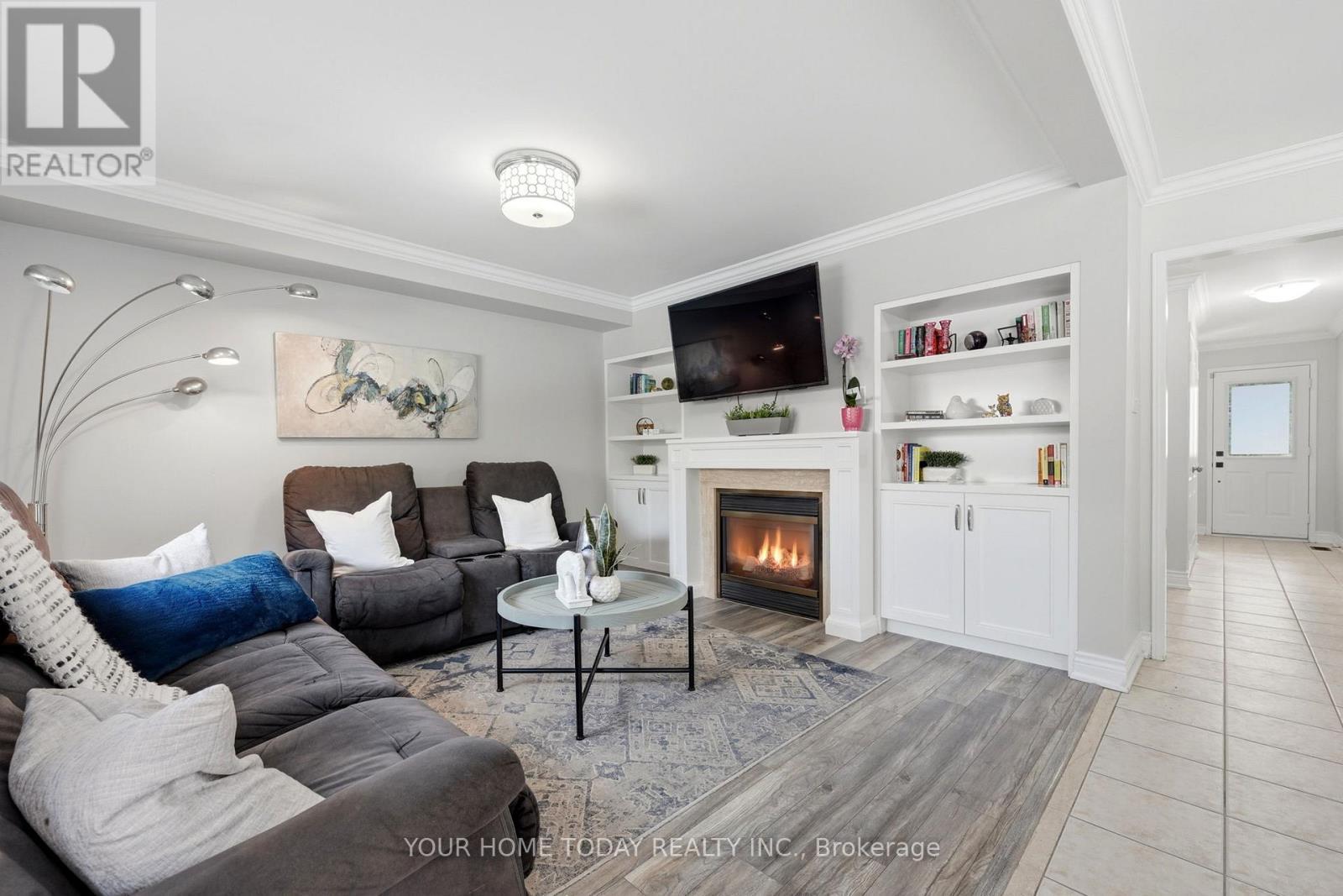 19 Mcnally Street, Halton Hills, ON - Indoor Photo Showing Living Room With Fireplace
