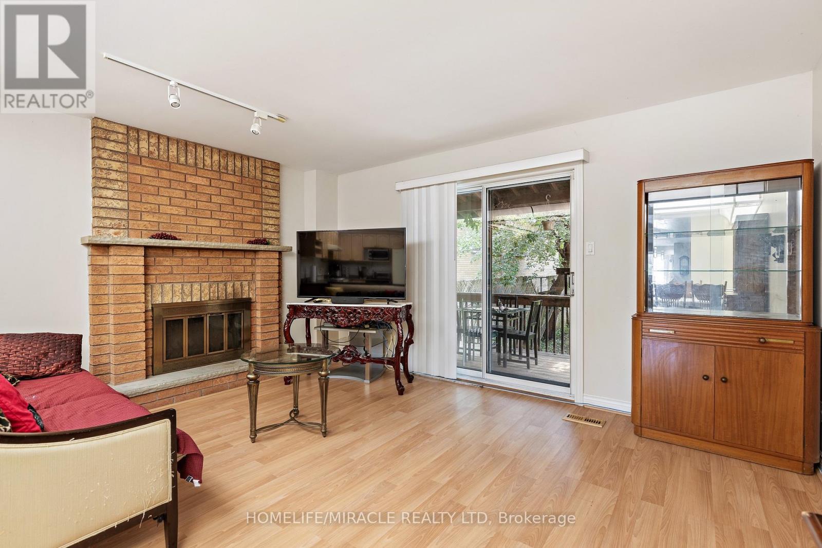 33 Torrens Avenue, Toronto, ON - Indoor Photo Showing Living Room With Fireplace