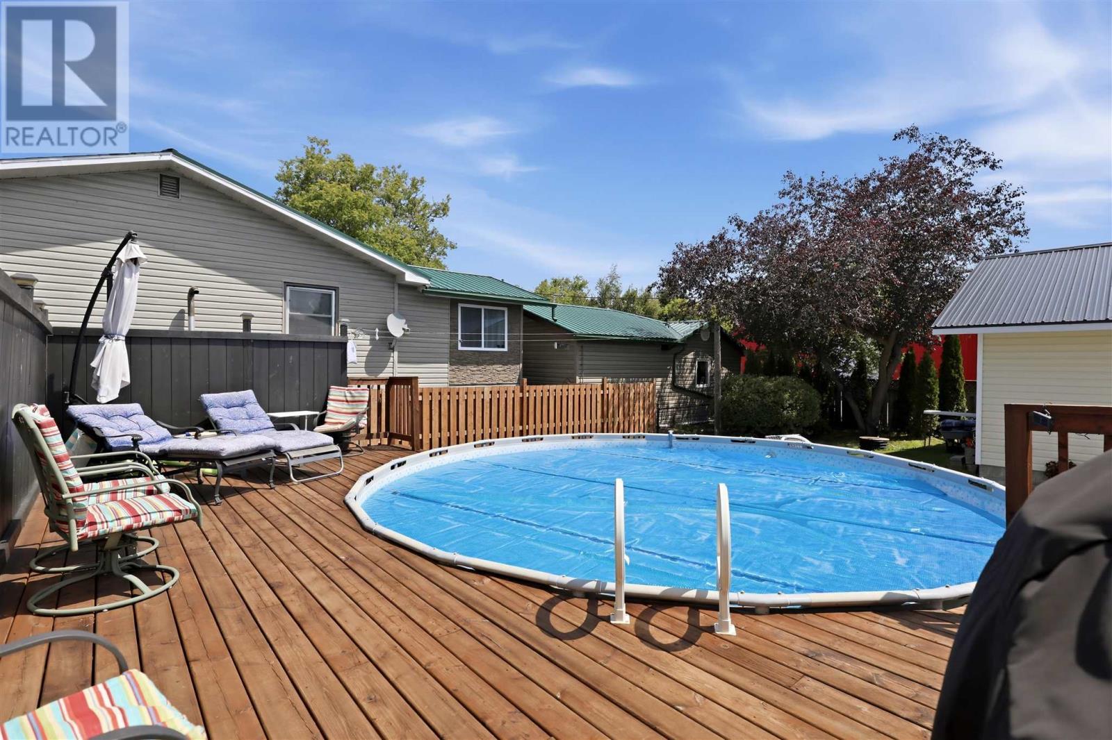 219 Main St, Thessalon, ON - Outdoor With Above Ground Pool With Deck Patio Veranda