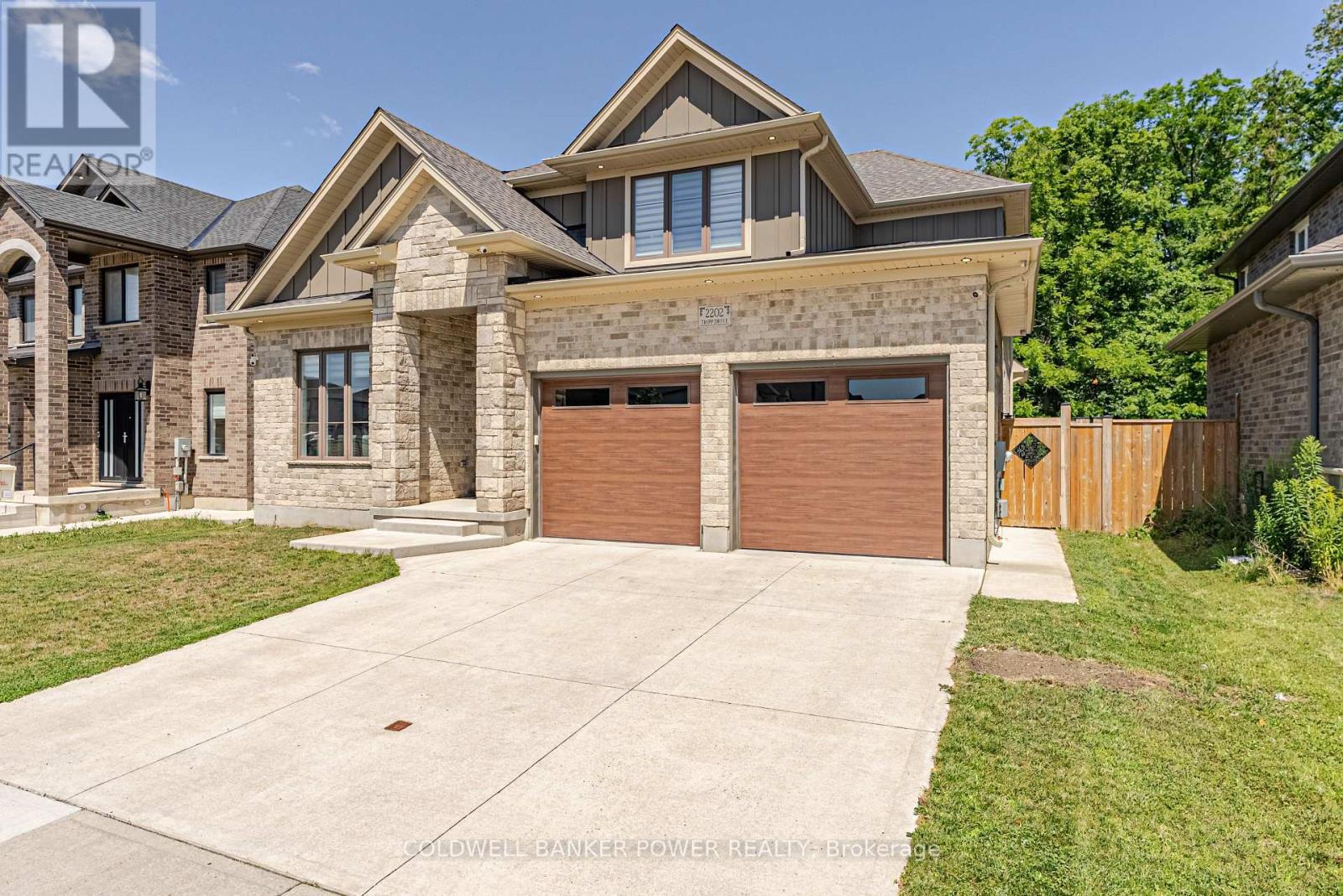 2202 Tripp Drive, London South (South V), ON - Outdoor With Facade