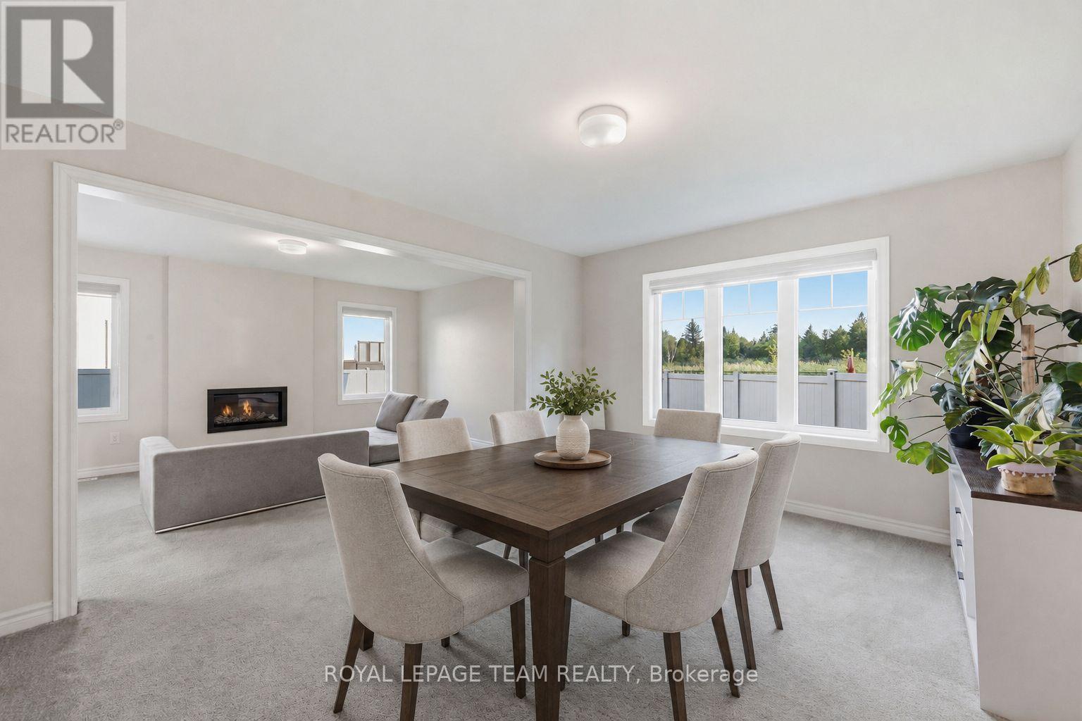 Dining Room Virtually Staged - 153 Unity Place, Ottawa, ON - Indoor Photo Showing Dining Room With Fireplace