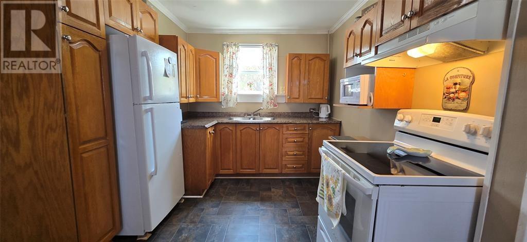 14 Logwood Drive, Fortune, NL - Indoor Photo Showing Kitchen With Double Sink