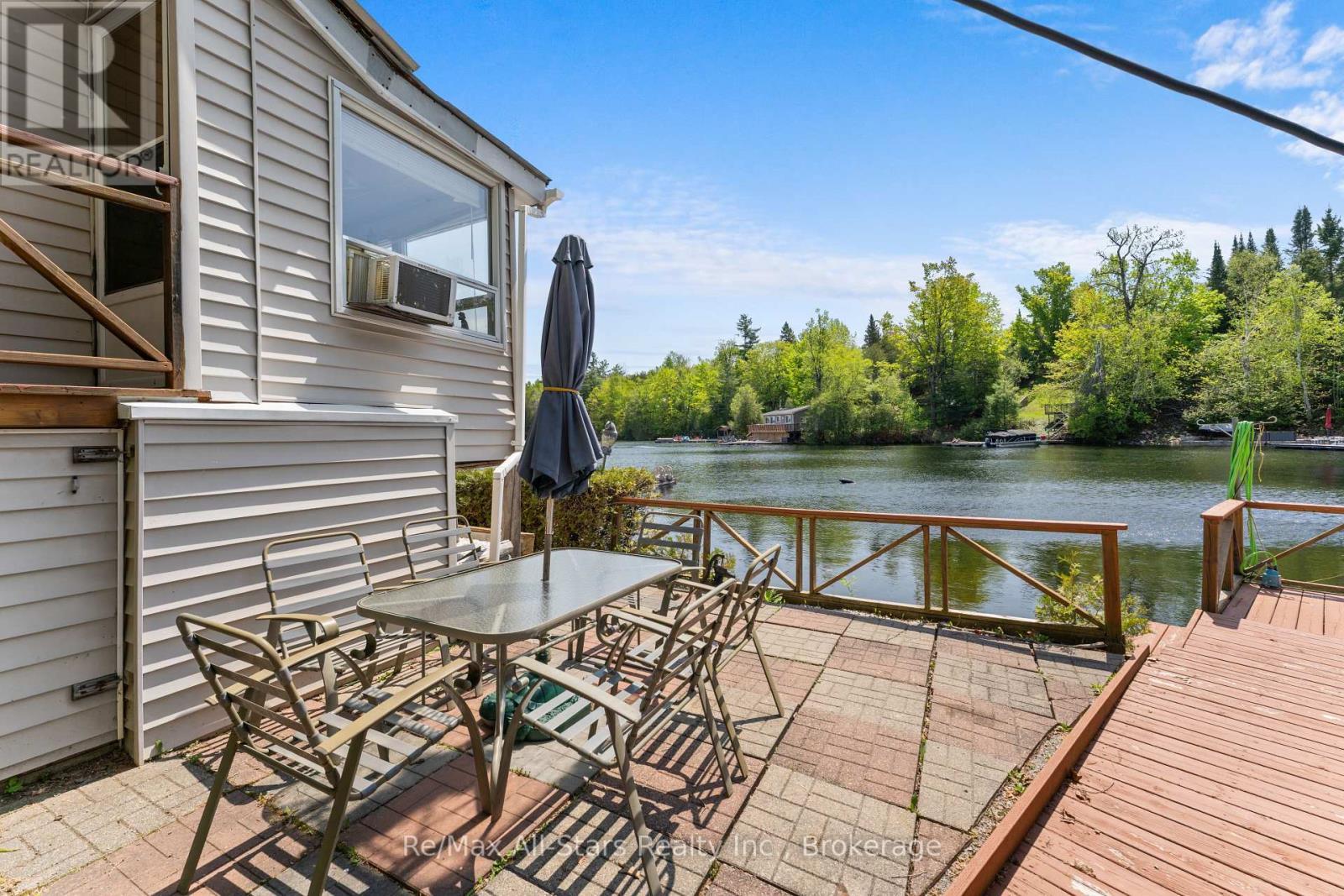 55 Fire Route 393, Trent Lakes, ON - Outdoor With Body Of Water With Deck Patio Veranda With Exterior