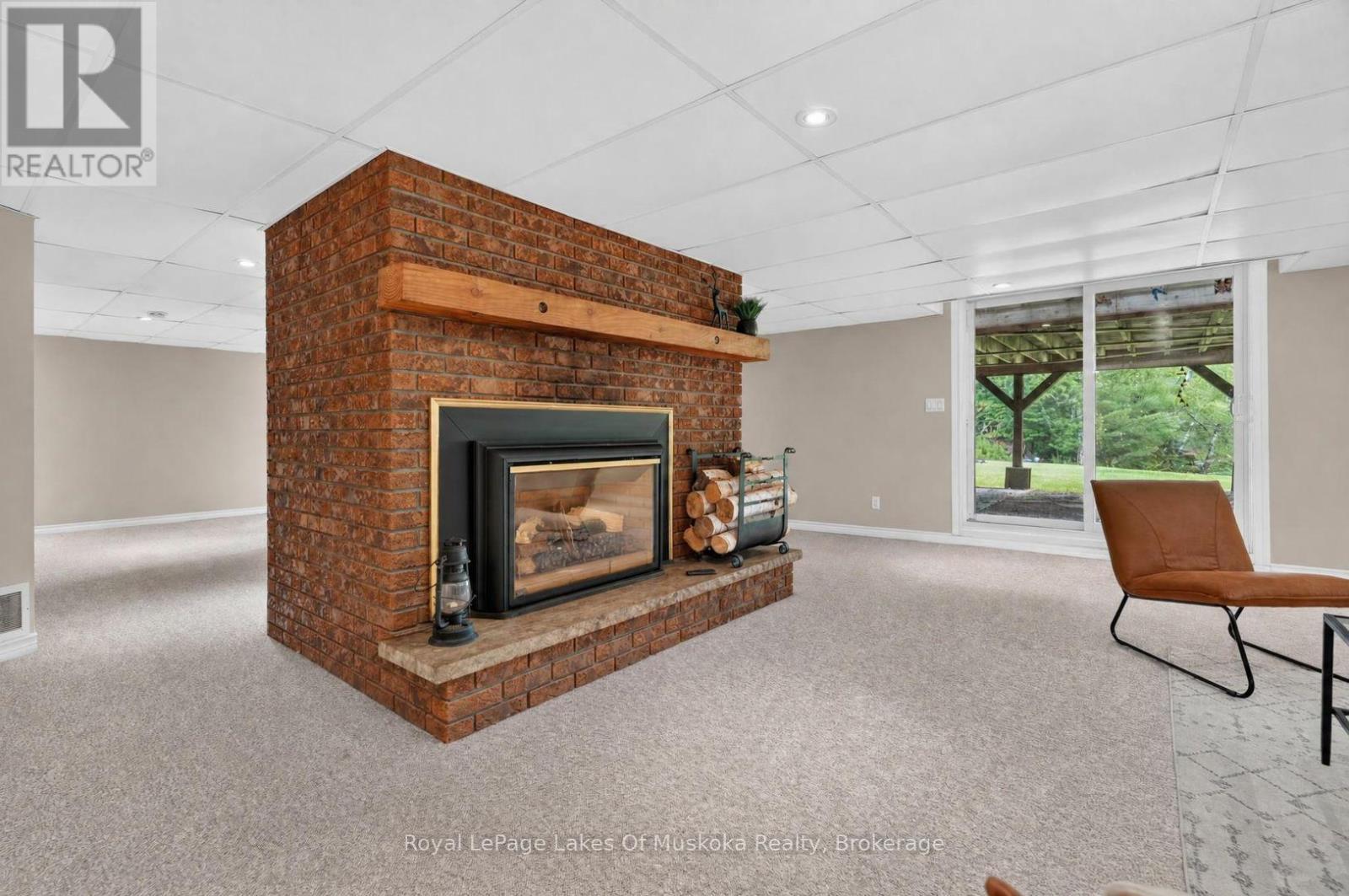44 Shellwood Shores Avenue, Huntsville (Brunel), ON - Indoor Photo Showing Other Room With Fireplace