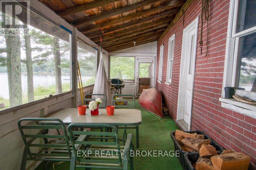 148B Oak Shores Lane, Frontenac (Frontenac South), ON - Outdoor With Deck Patio Veranda With Exterior