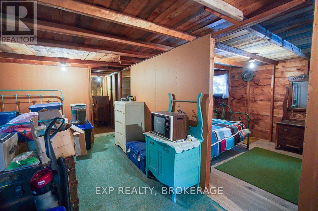 148B Oak Shores Lane, Frontenac (Frontenac South), ON - Indoor Photo Showing Basement
