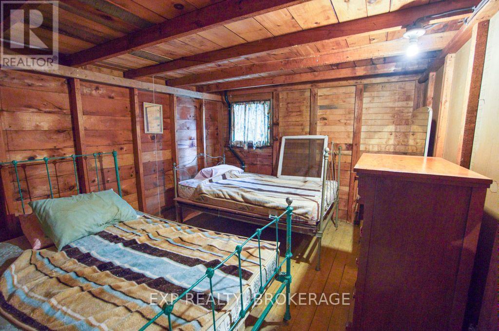 148B Oak Shores Lane, Frontenac (Frontenac South), ON - Indoor Photo Showing Bedroom