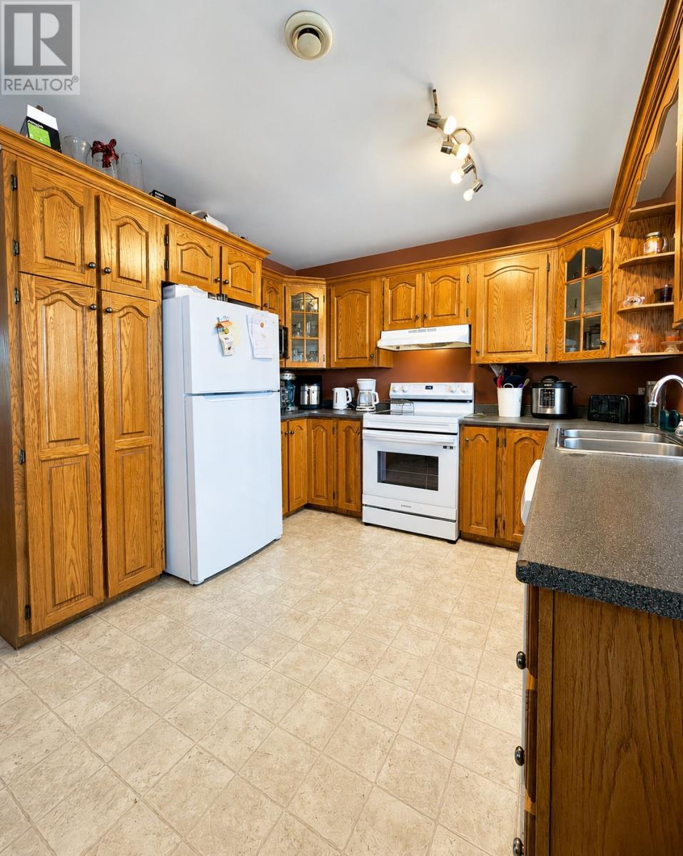 3 White Rose Place, Clarenville, NL - Indoor Photo Showing Kitchen With Double Sink