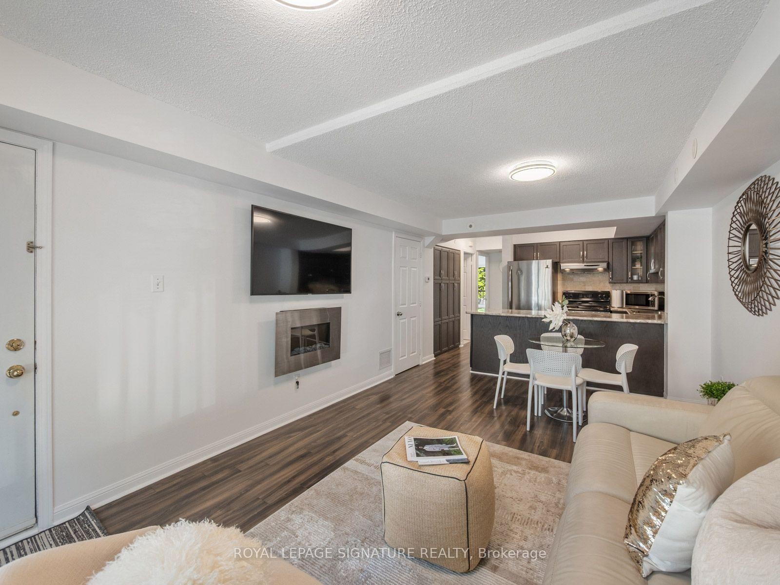 2067-65 George Appleton Way, Toronto, ON - Indoor Photo Showing Living Room With Fireplace