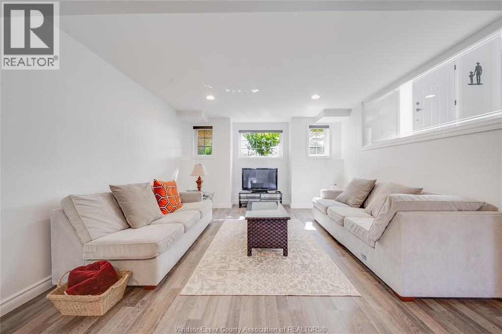 3857 Socrates Court, Windsor, ON - Indoor Photo Showing Living Room
