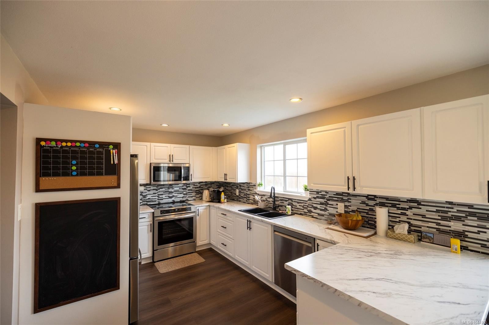 #1-2553 Kingcome Pl, Port Mcneill, BC - Indoor Photo Showing Kitchen With Stainless Steel Kitchen With Double Sink With Upgraded Kitchen