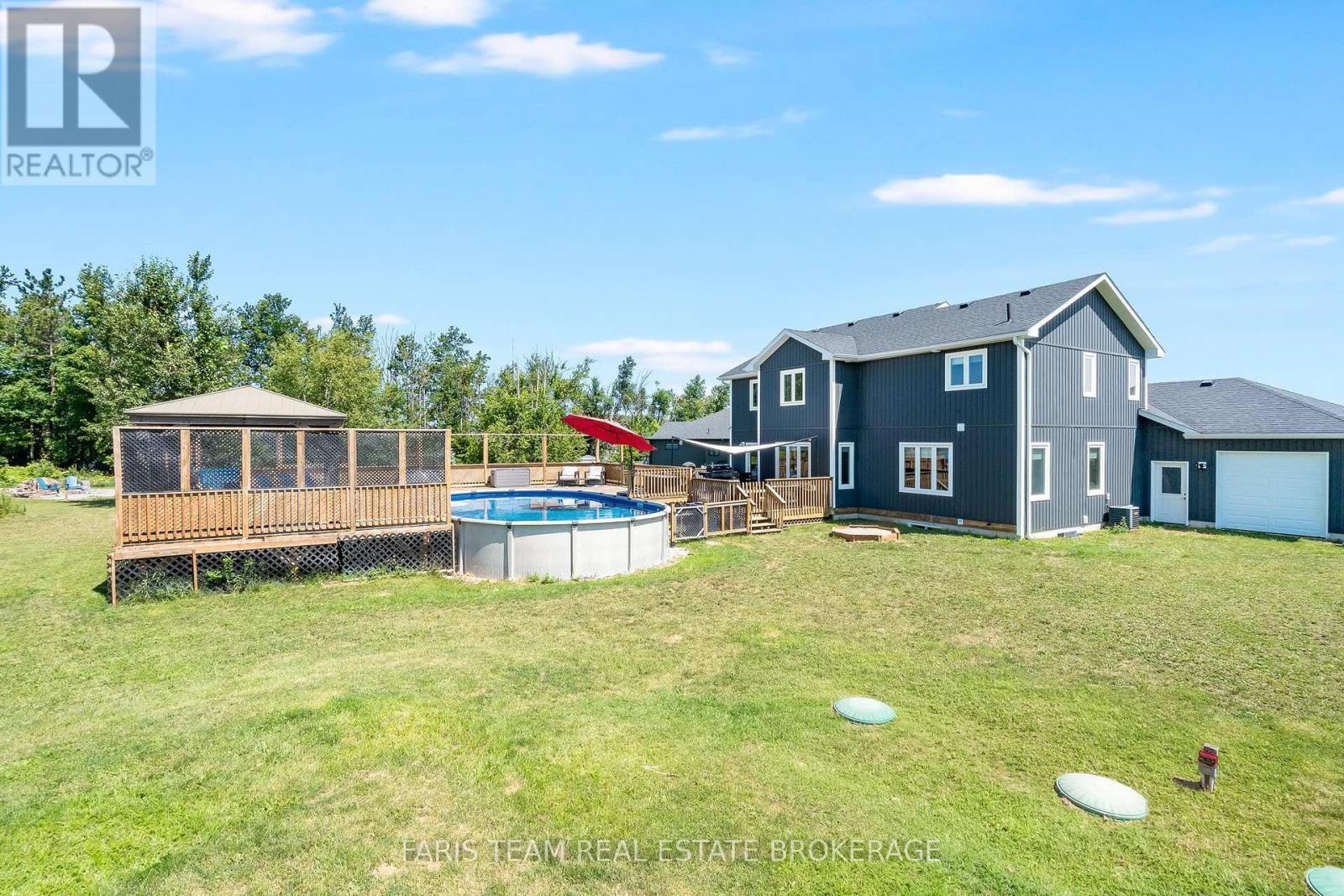 4 Cheslock Crescent, Oro-Medonte, ON - Outdoor With Above Ground Pool With Backyard