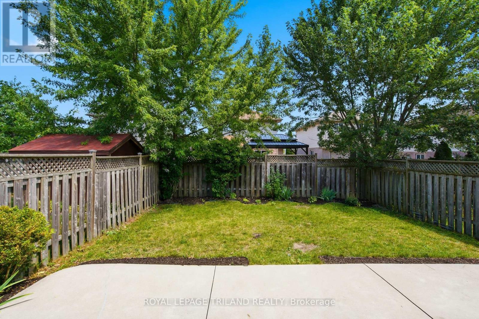 Fenced yard - 1942 Bloom Crescent, London North (North C), ON - Outdoor With Backyard