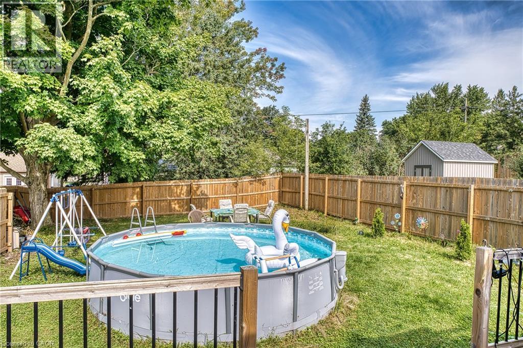 backyard - 80 Carling Terrace, Wingham, ON - Outdoor With Above Ground Pool With Backyard