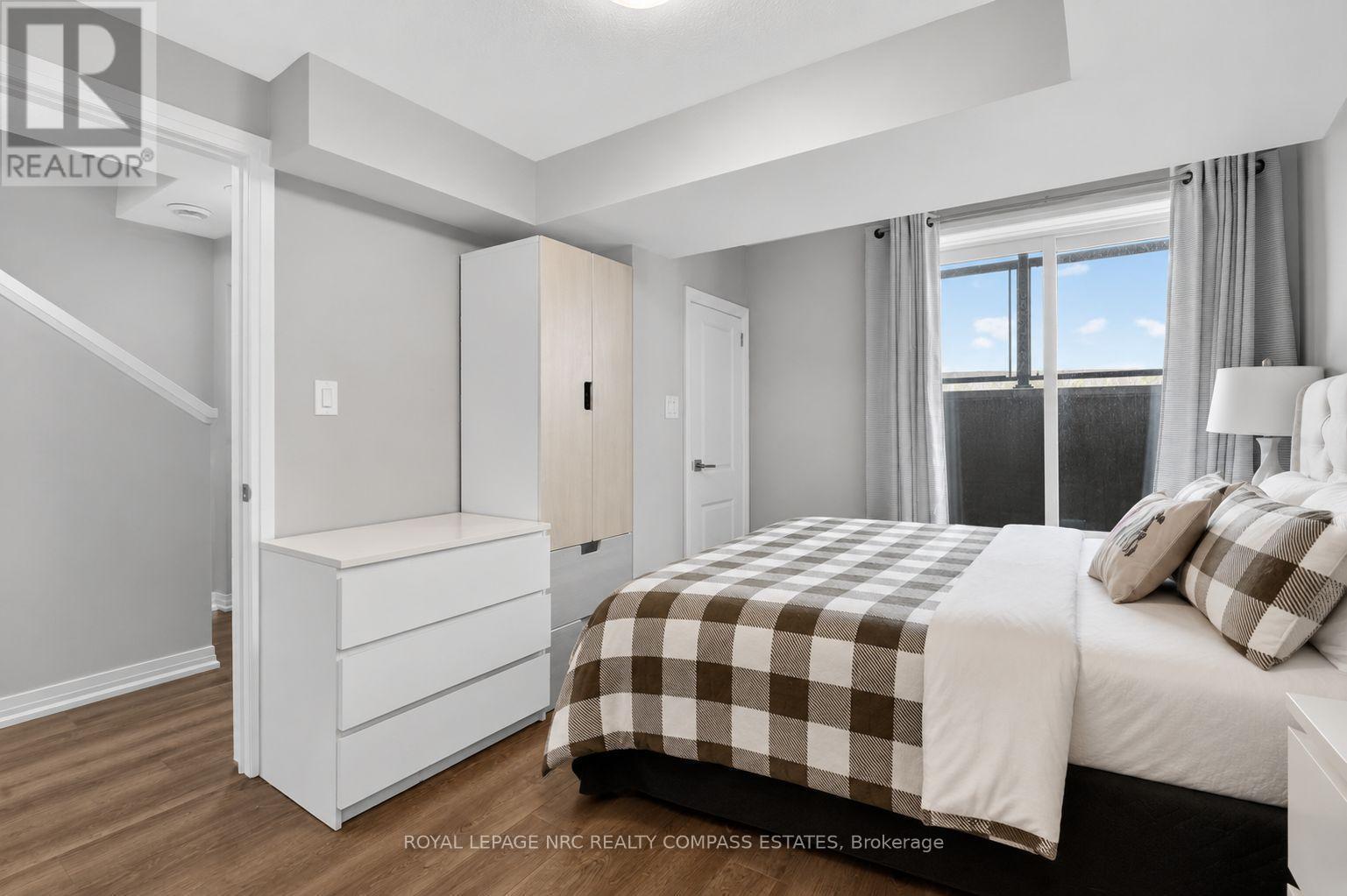 119 - 6705 Cropp Street, Niagara Falls (Morrison), ON - Indoor Photo Showing Bedroom