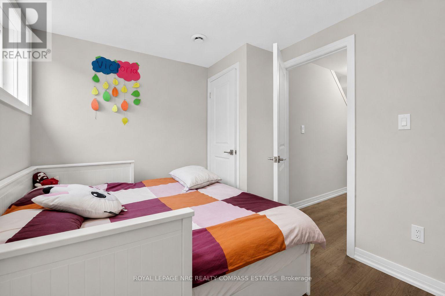 119 - 6705 Cropp Street, Niagara Falls (Morrison), ON - Indoor Photo Showing Bedroom