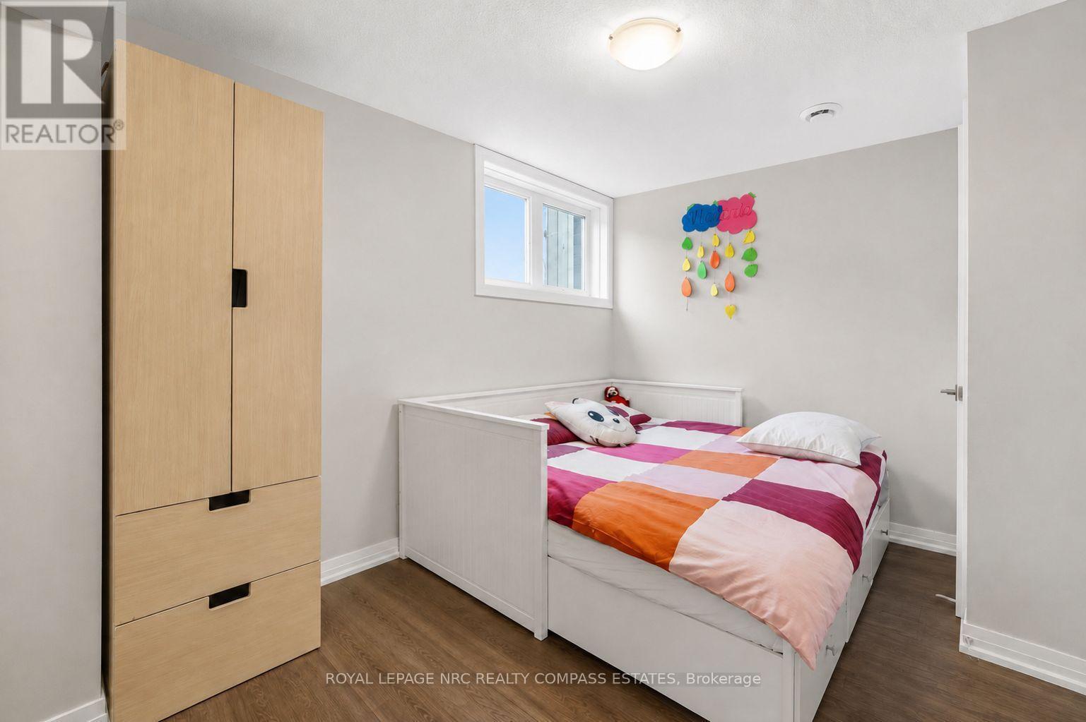 119 - 6705 Cropp Street, Niagara Falls (Morrison), ON - Indoor Photo Showing Bedroom