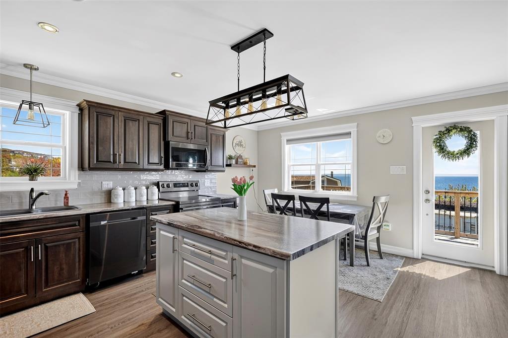 13 The Green Road, Upper Island Cove, NL - Indoor Photo Showing Kitchen With Double Sink