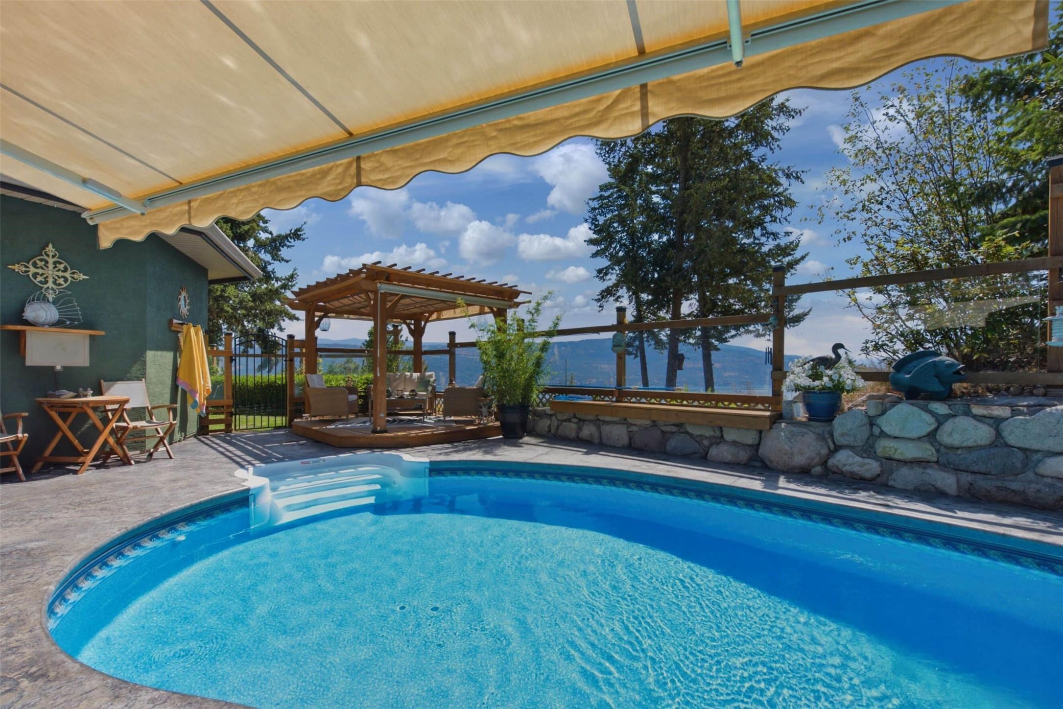 594 Mountain Drive, Vernon, BC - Outdoor With In Ground Pool With Deck Patio Veranda