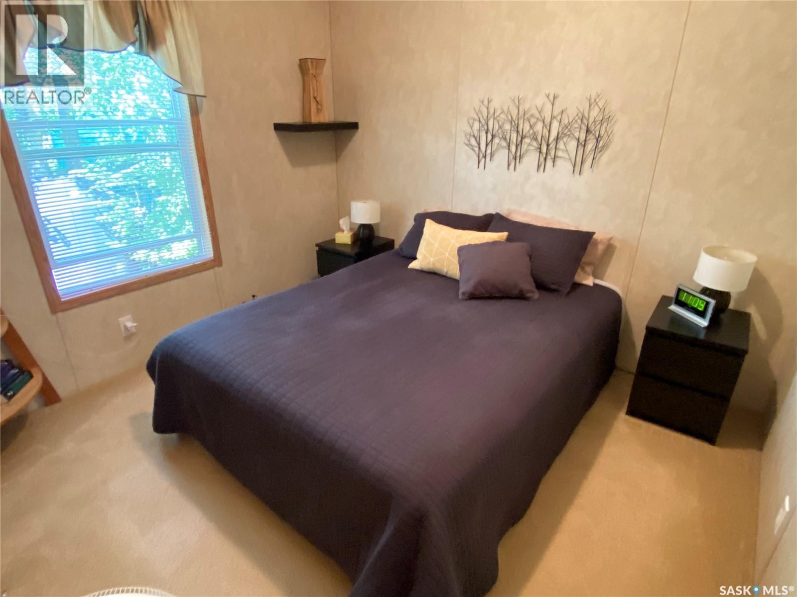 25-26 Eugene Drive, Good Spirit Lake, SK - Indoor Photo Showing Bedroom