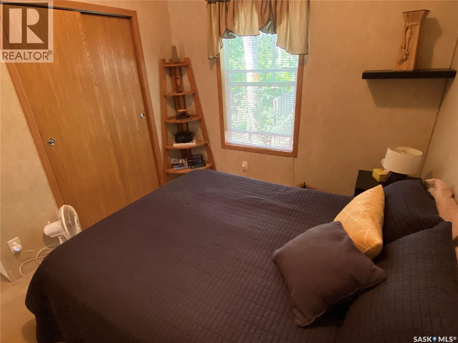 25-26 Eugene Drive, Good Spirit Lake, SK - Indoor Photo Showing Bedroom