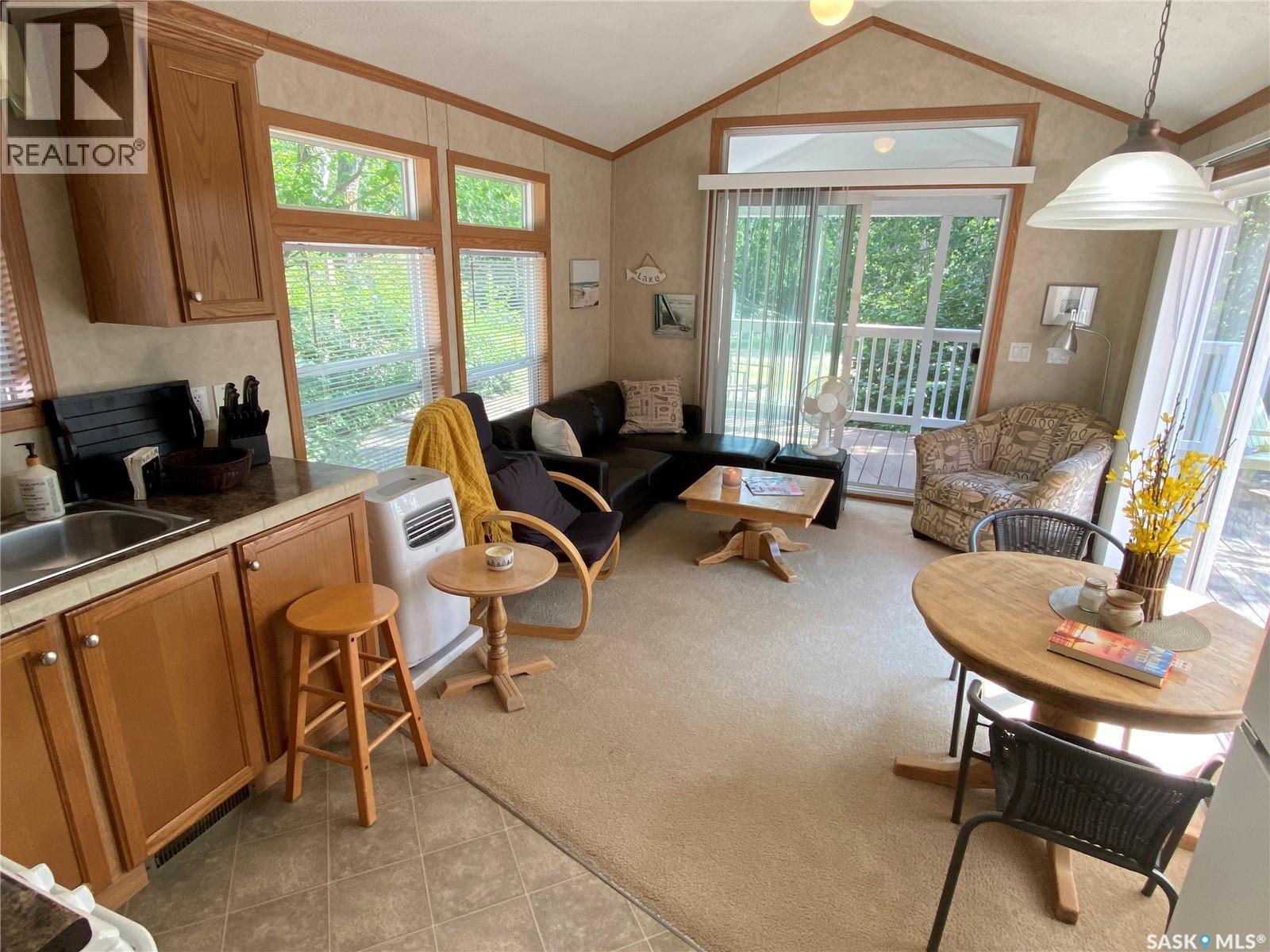 25-26 Eugene Drive, Good Spirit Lake, SK - Indoor Photo Showing Living Room