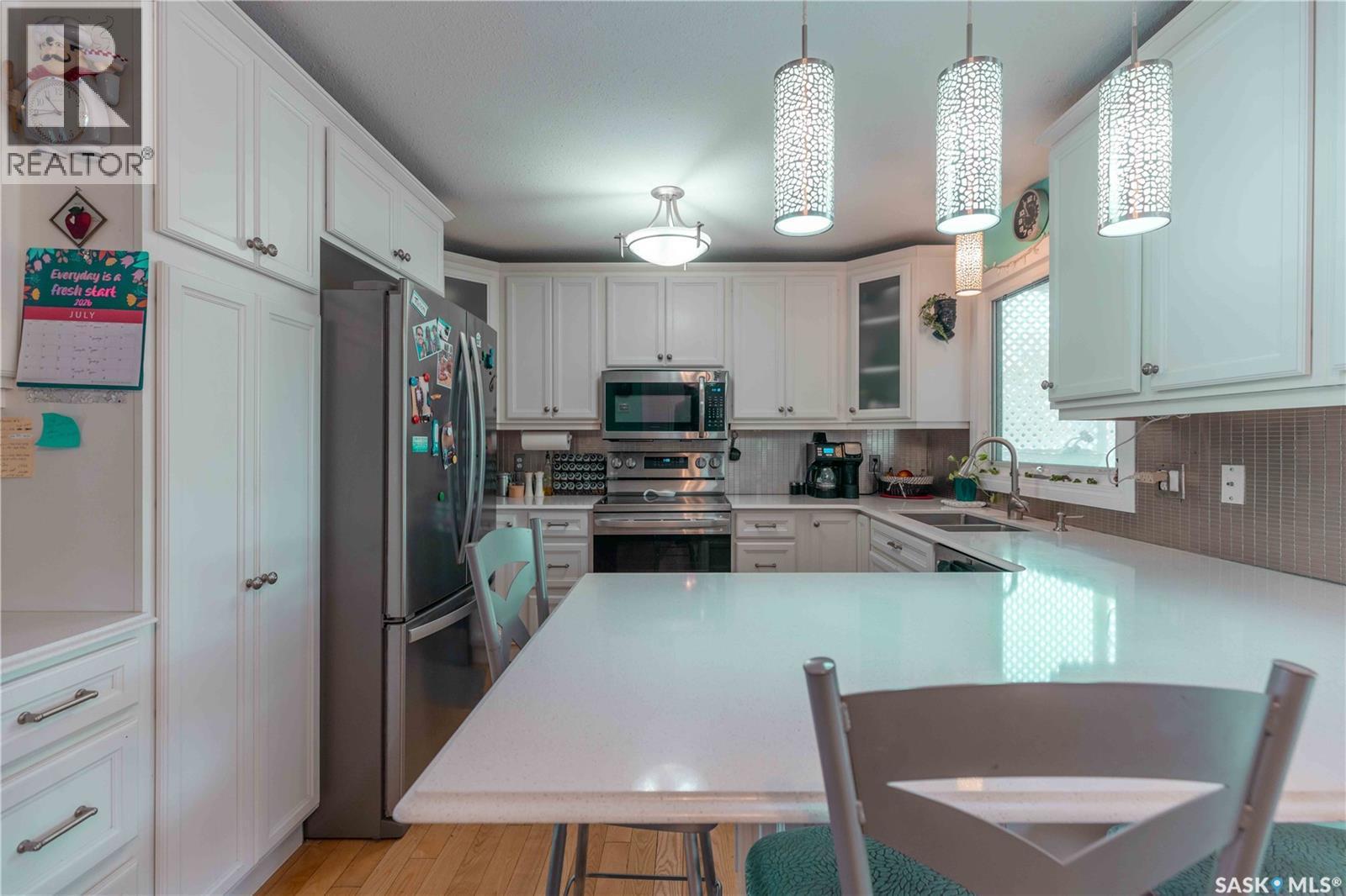 50 Manitou Court, Saskatoon, SK - Indoor Photo Showing Kitchen With Double Sink