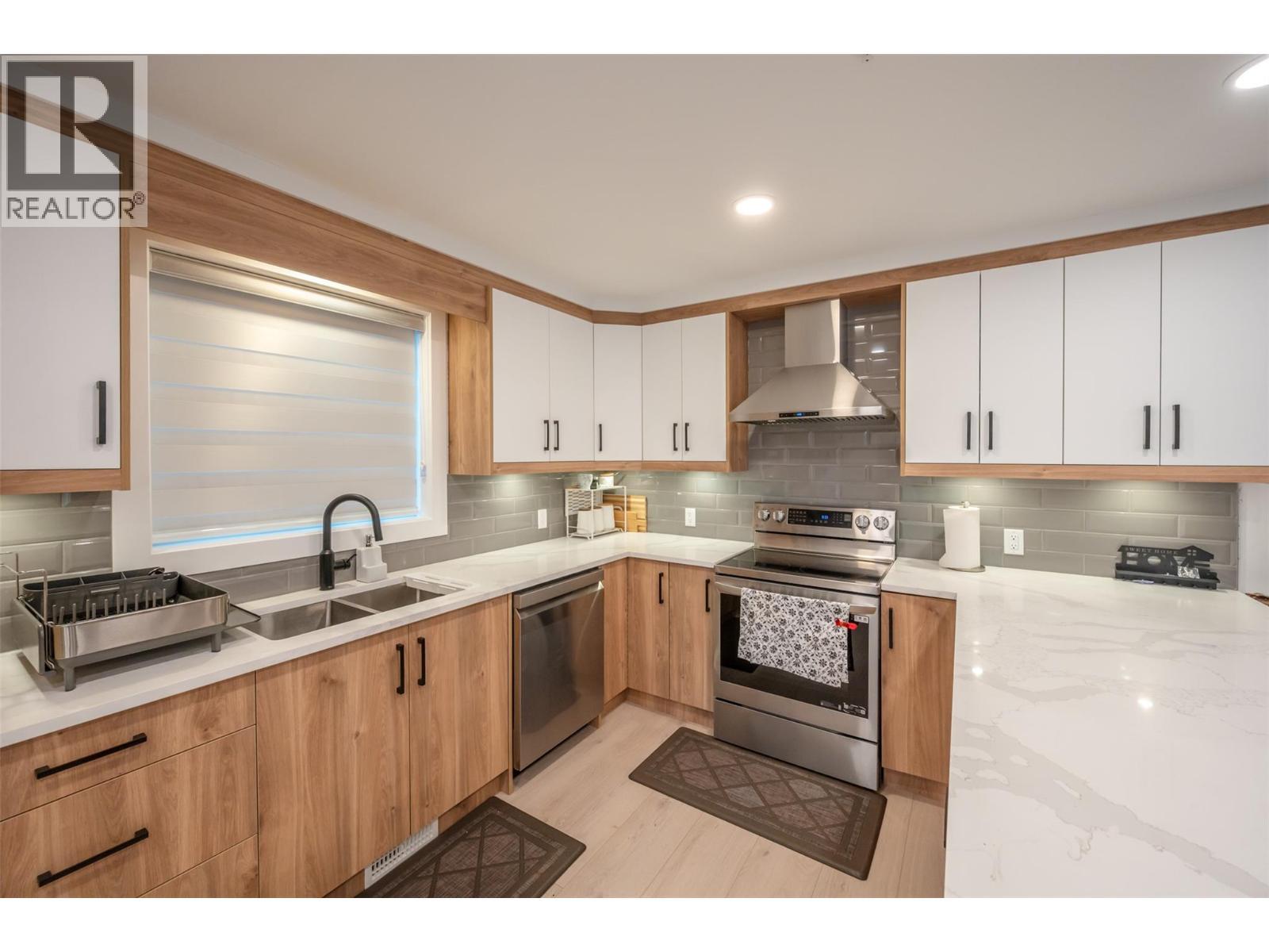 10615 Elliott Street Unit# 106, Summerland, BC - Indoor Photo Showing Kitchen With Double Sink