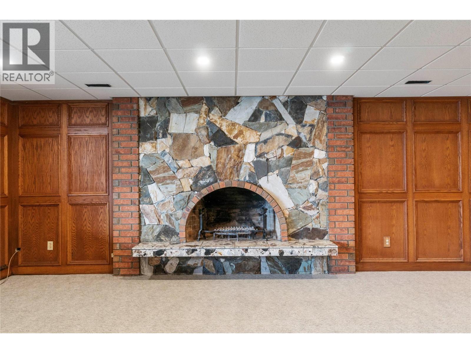8758 Holding Road Unit# 1, Adams Lake, BC - Indoor Photo Showing Other Room With Fireplace