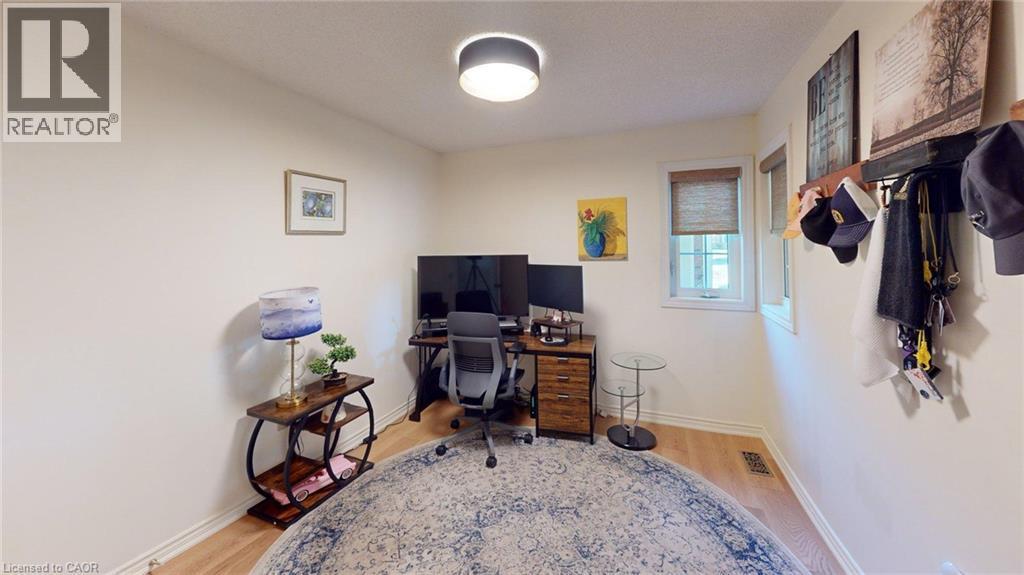 Room featuring wood-finish flooring, recessed lighting, and multiple windows with natural light - 4101 Diana Park, Vineland, ON - Indoor Photo Showing Office
