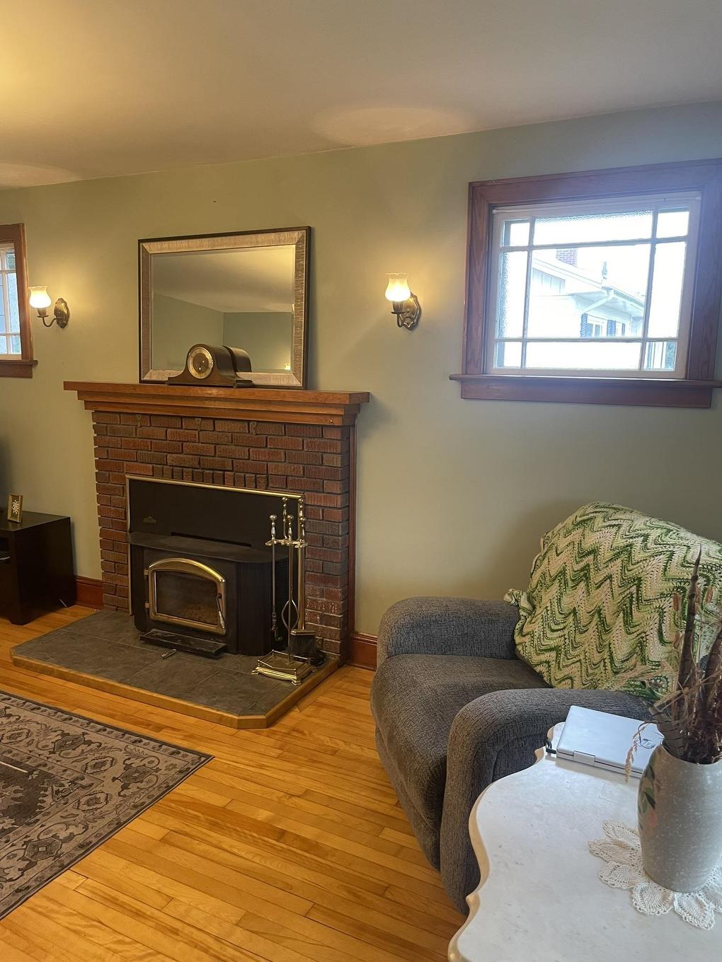11 Belle Avenue, Souris, PE - Indoor Photo Showing Living Room With Fireplace