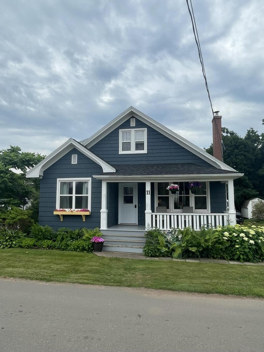 11 Belle Avenue, Souris, PE - Outdoor With Deck Patio Veranda With Facade