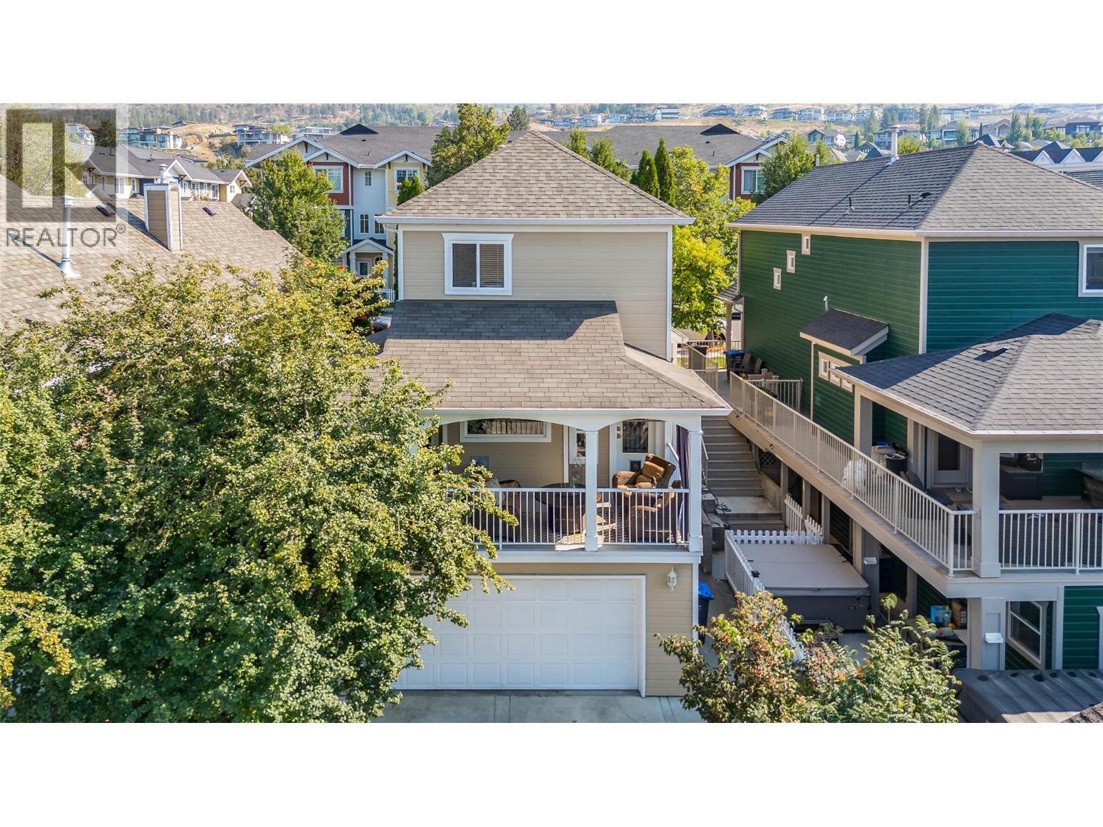 Back deck viewed from the back of the house. - 430 Mccarren Avenue, Kelowna, BC - Outdoor With Deck Patio Veranda