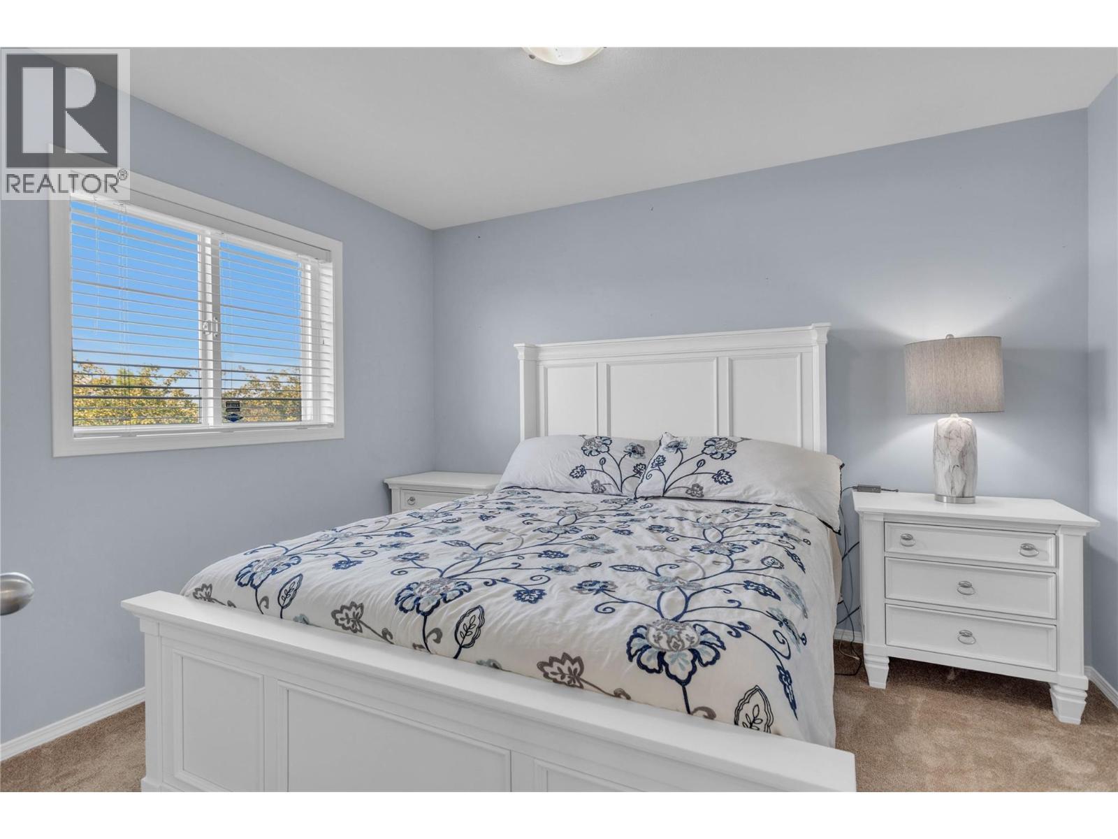 2nd bedroom on the upper floor. - 430 Mccarren Avenue, Kelowna, BC - Indoor Photo Showing Bedroom