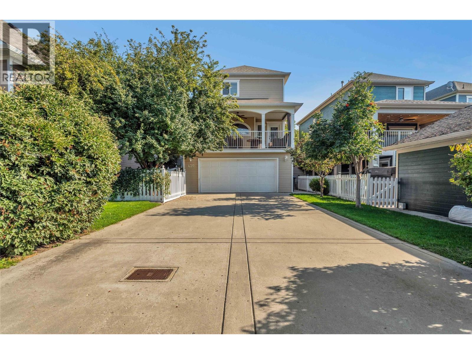 Lots of parking room ouitside of the 2-car garage. - 430 Mccarren Avenue, Kelowna, BC - Outdoor