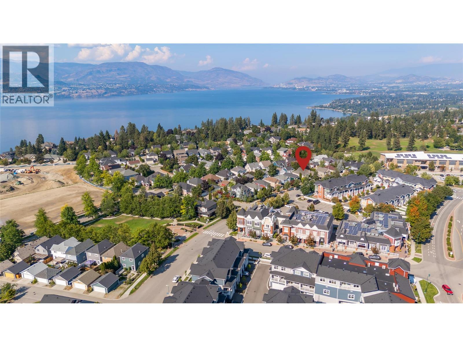 So much green space with walking/cycling trails. - 430 Mccarren Avenue, Kelowna, BC - Outdoor With Body Of Water With View