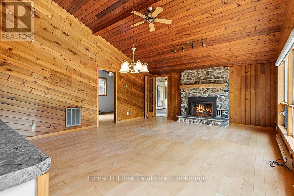 Kitchen opens to Living Room - 344511 North Line, West Grey, ON - Indoor Photo Showing Living Room With Fireplace