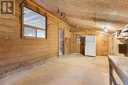 Workshop opens into Garage -