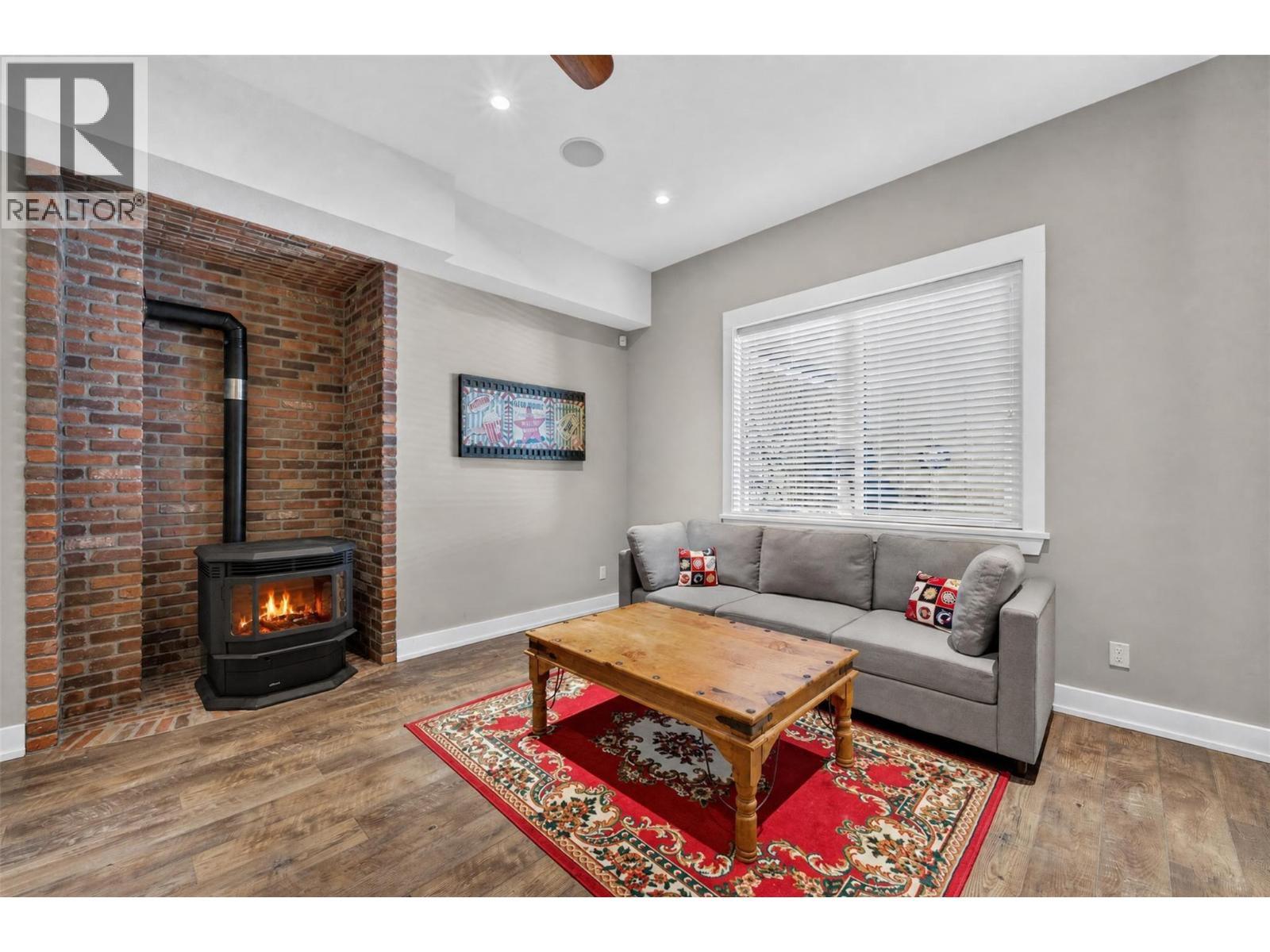 4119 Galligan Road Unit# 12, Eagle Bay, BC - Indoor Photo Showing Living Room With Fireplace