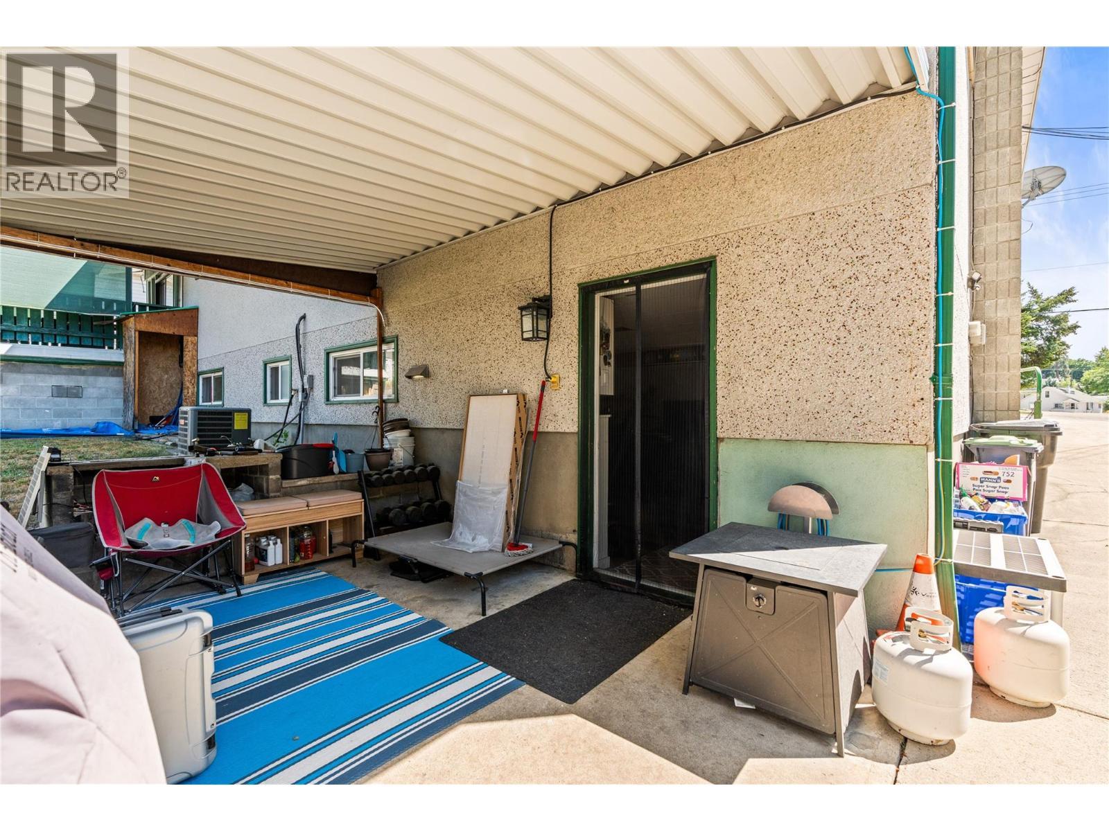 Lower Level Suite access. Covered seating area - 1603 43Rd Avenue, Vernon, BC - Outdoor With Exterior