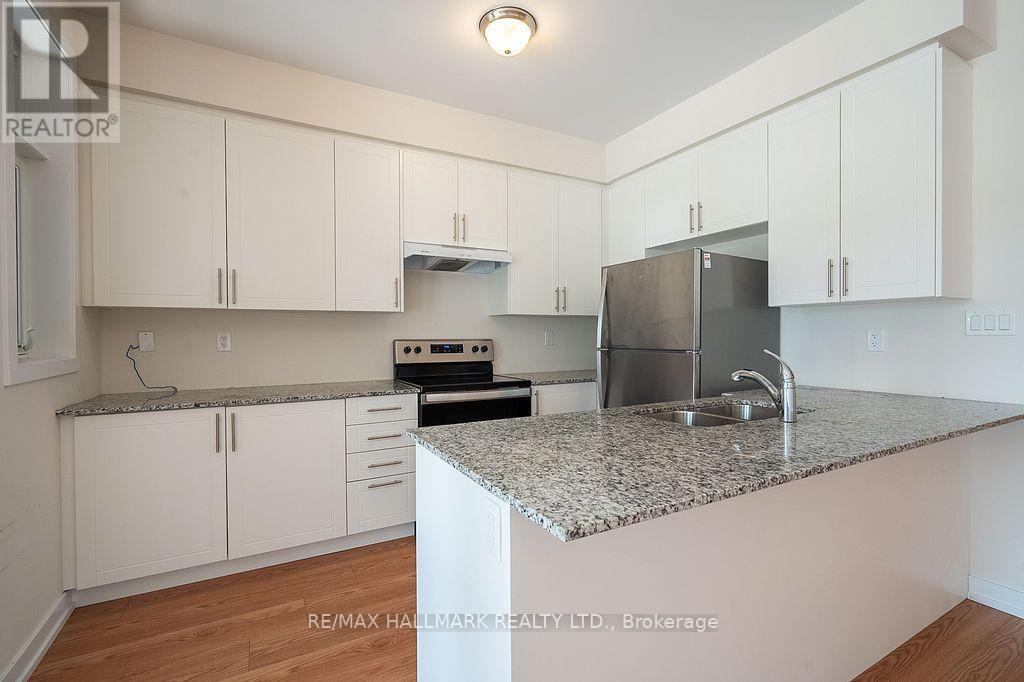 12 Dandara Gate Se, Vaughan, ON - Indoor Photo Showing Kitchen With Double Sink With Upgraded Kitchen