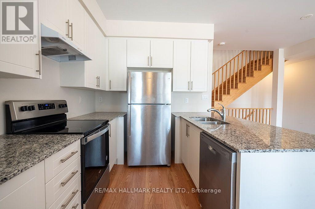 12 Dandara Gate Se, Vaughan, ON - Indoor Photo Showing Kitchen With Stainless Steel Kitchen With Double Sink With Upgraded Kitchen